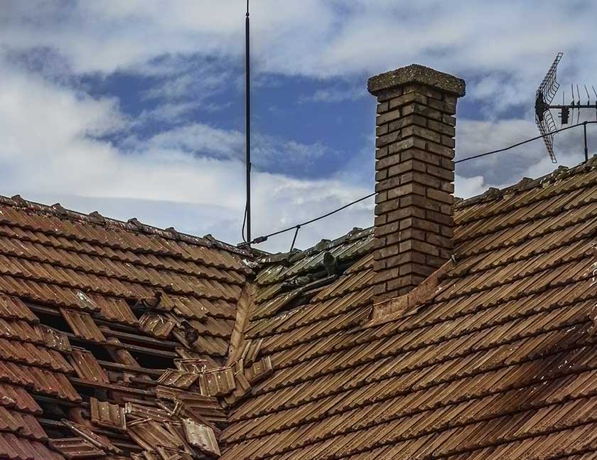 prevent blocked drain pipe replace roof tiles